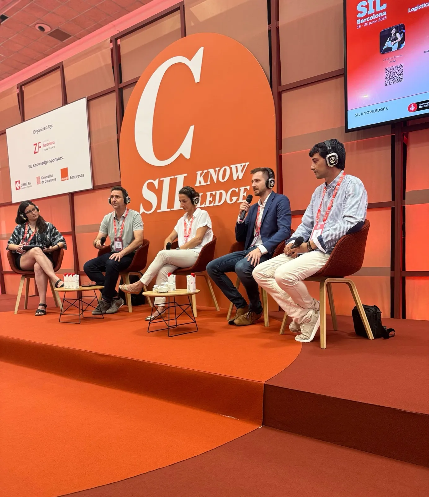 Jakob speaking on a panel at the SIL logistics fair in Barcelona, June 2025.